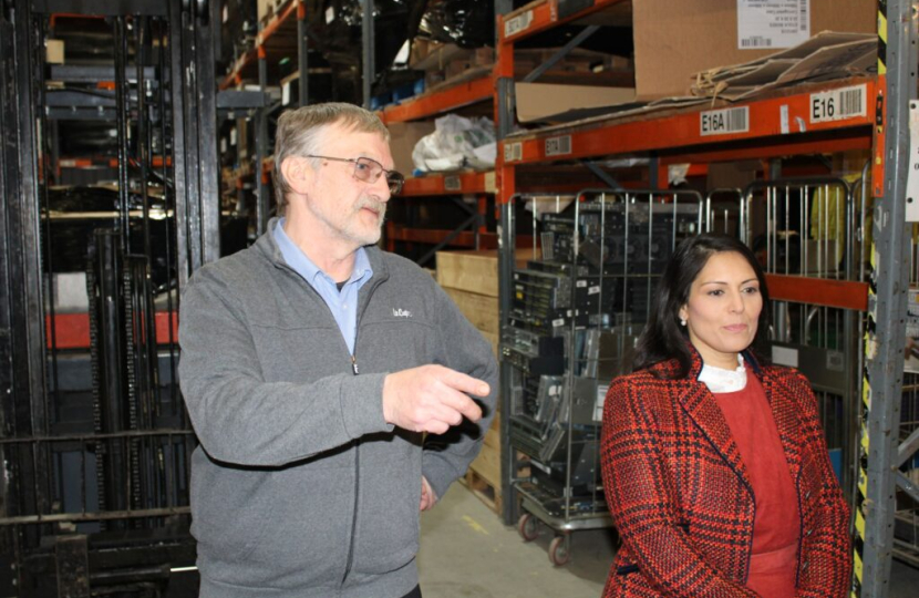 Priti with Jim Bromley, Chief Operating Officer at ICEX during her tour of the reprocessing centre at ICEX.