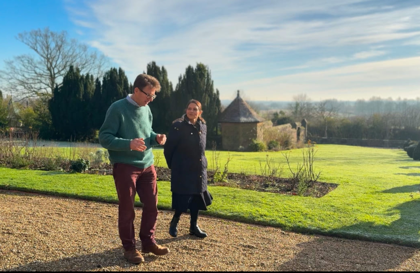 Priti walking the grounds of the Layer Marney estate with owner Nicholas Charrington