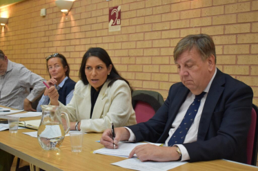 Priti Patel John Whittingdale bus summit meeting